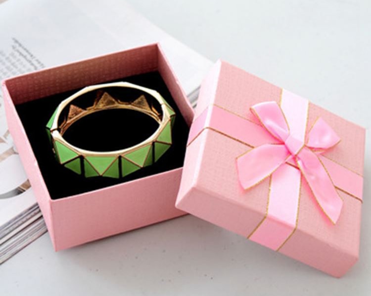 Small cardboard jewelry boxes with ribbon